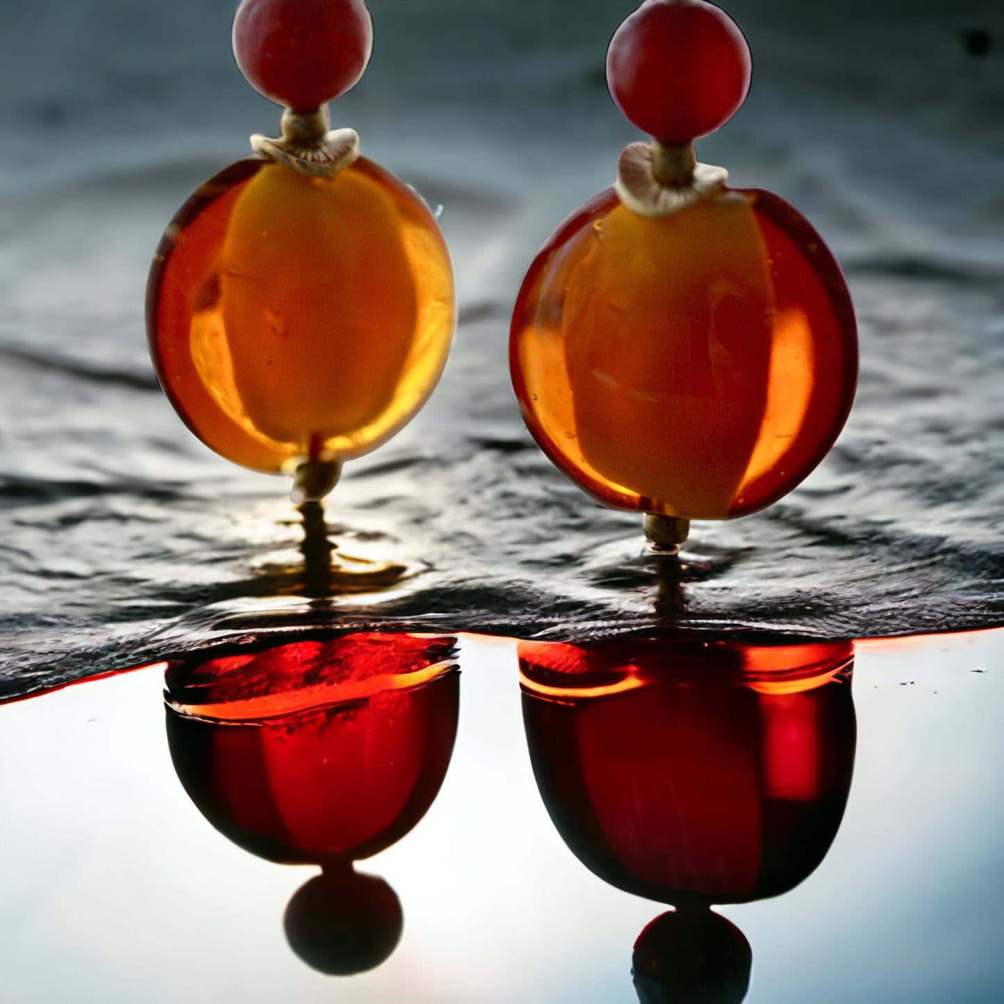 Orange and deep red dangle earrings