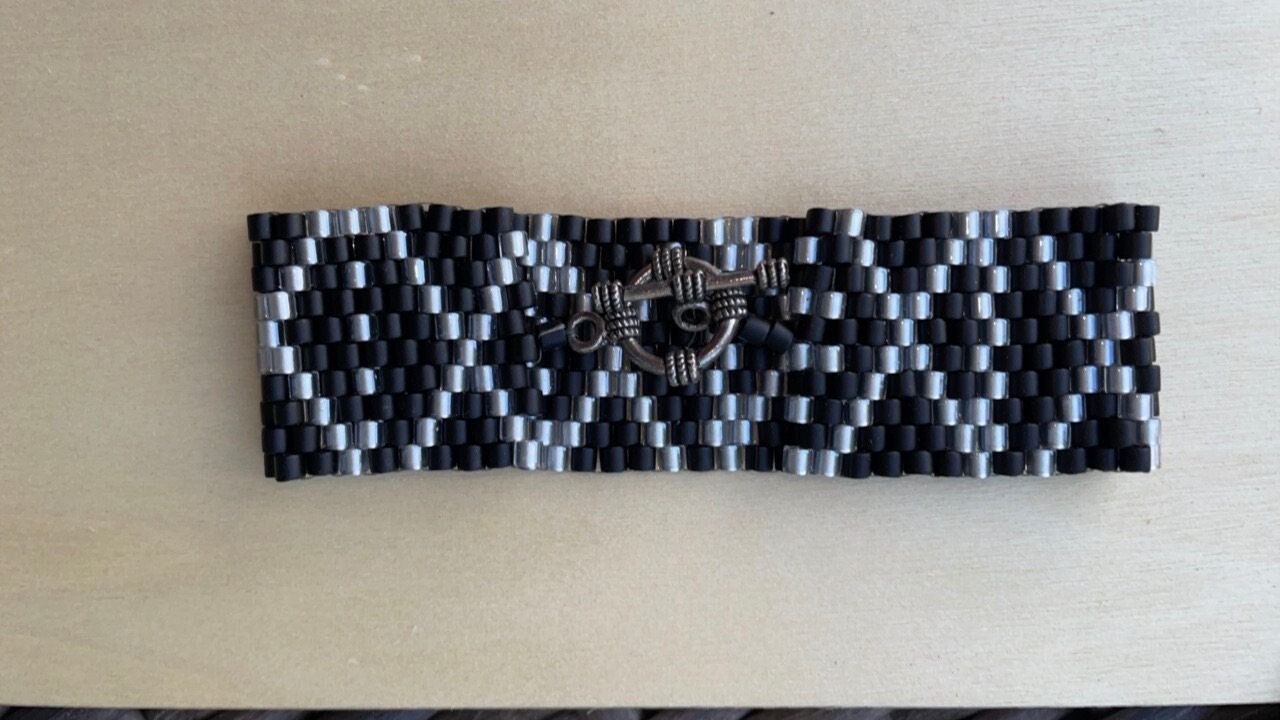 Stunning vintage silver and black hand woven vintage beadwork bracelet
