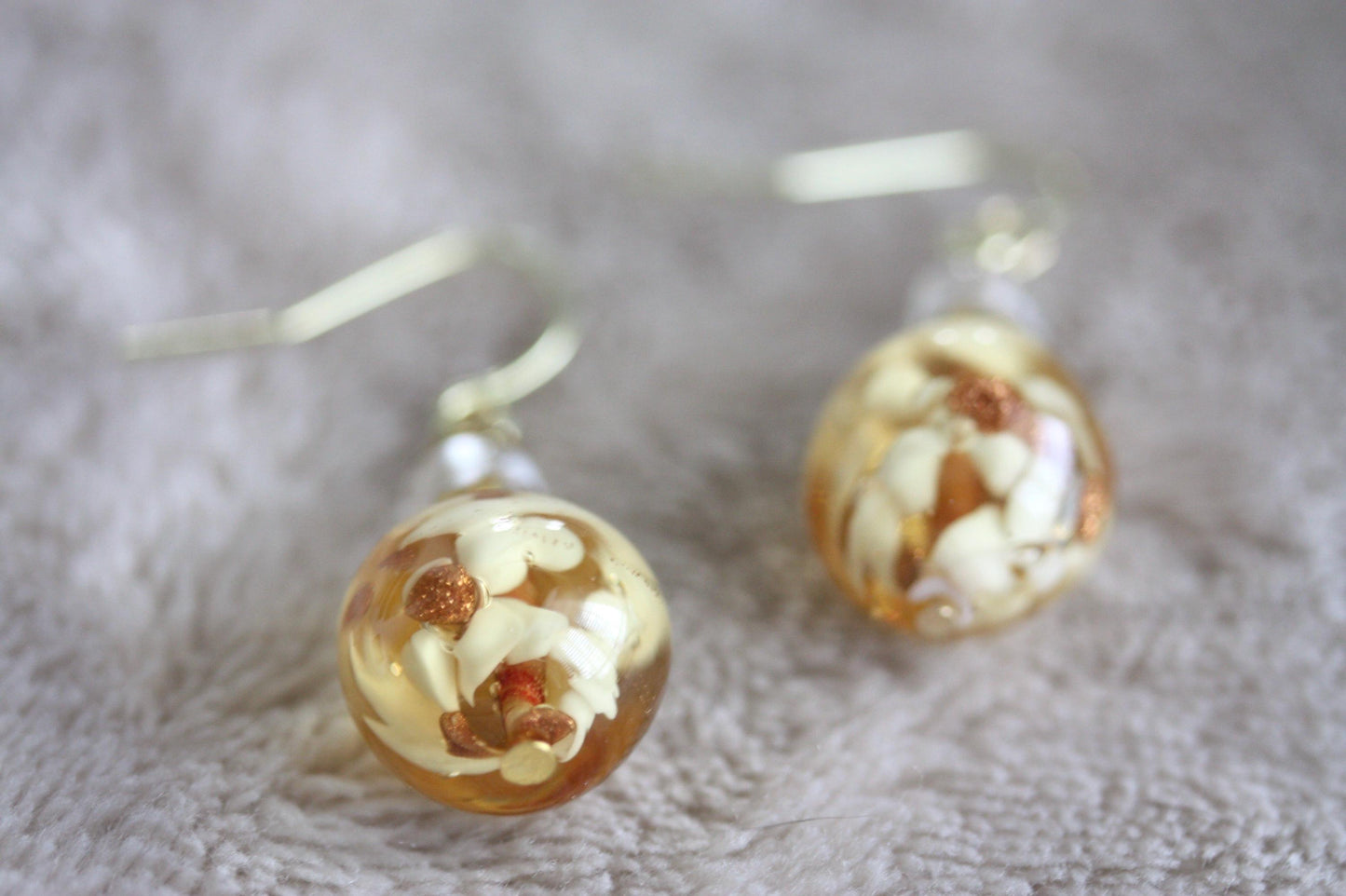 Stunning yellow and gold blown glass earrings with goldstone filigree - 1 and 1/4"