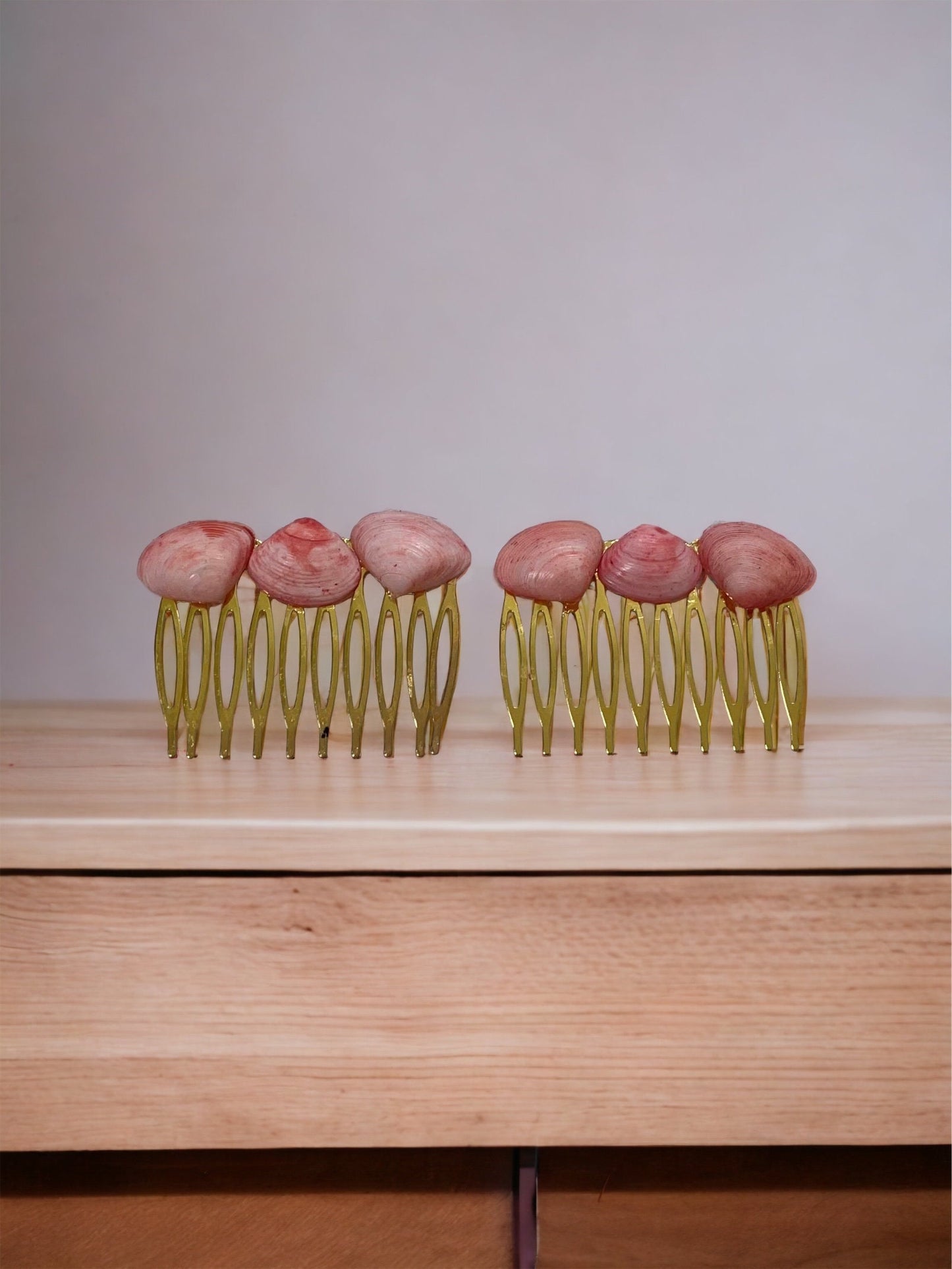 Pair of peach shell metal hair combs - 2" each