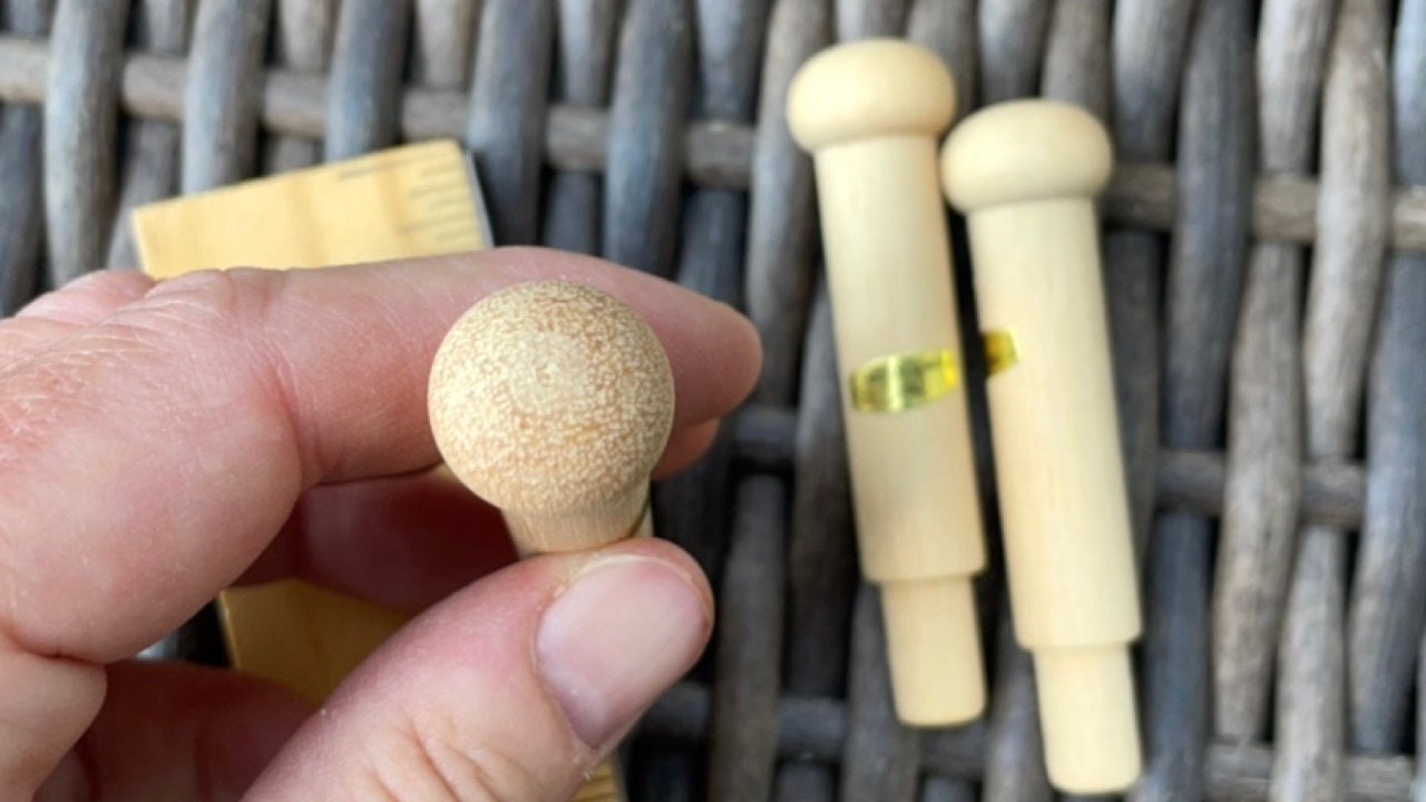 Unfinished solid wood pegs - great as craft supplies - for coat racks, doll making, wood sculptures, mixed material projects, etc.