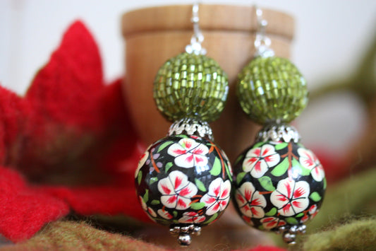 Green beaded bead and floral painted wood dangle earrings