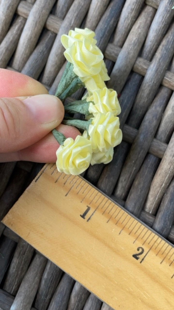 Three dozen individually wire stemmed faux flowers - available in 3 colors - yellow, cream or white