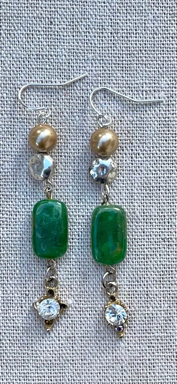 Unique long dangle earrings made with new and vintage mixed materials - hammered metal, gold faux pearls, vintage green drops and charms