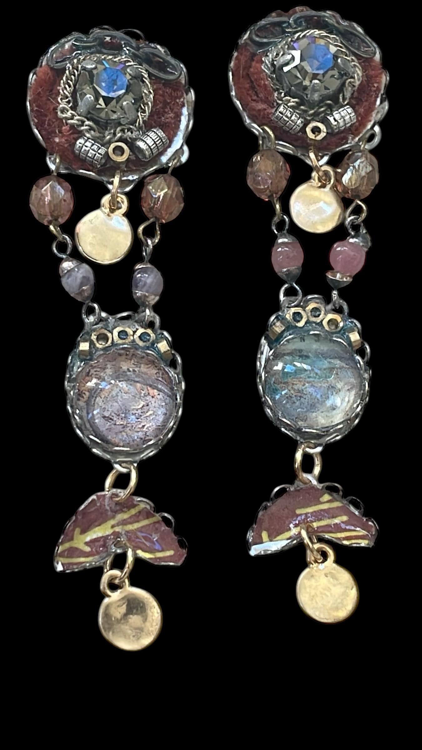 One-of-a-kind earrings made with, paper, fabric, velvet, rhinestones, chain, mixed metals and postage stamp remnants. Sterling ear wires.
