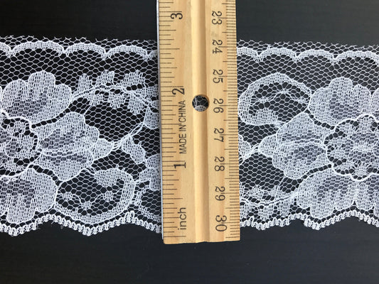 Wide (2 and one-half inches wide) vintage white lace - by the yard