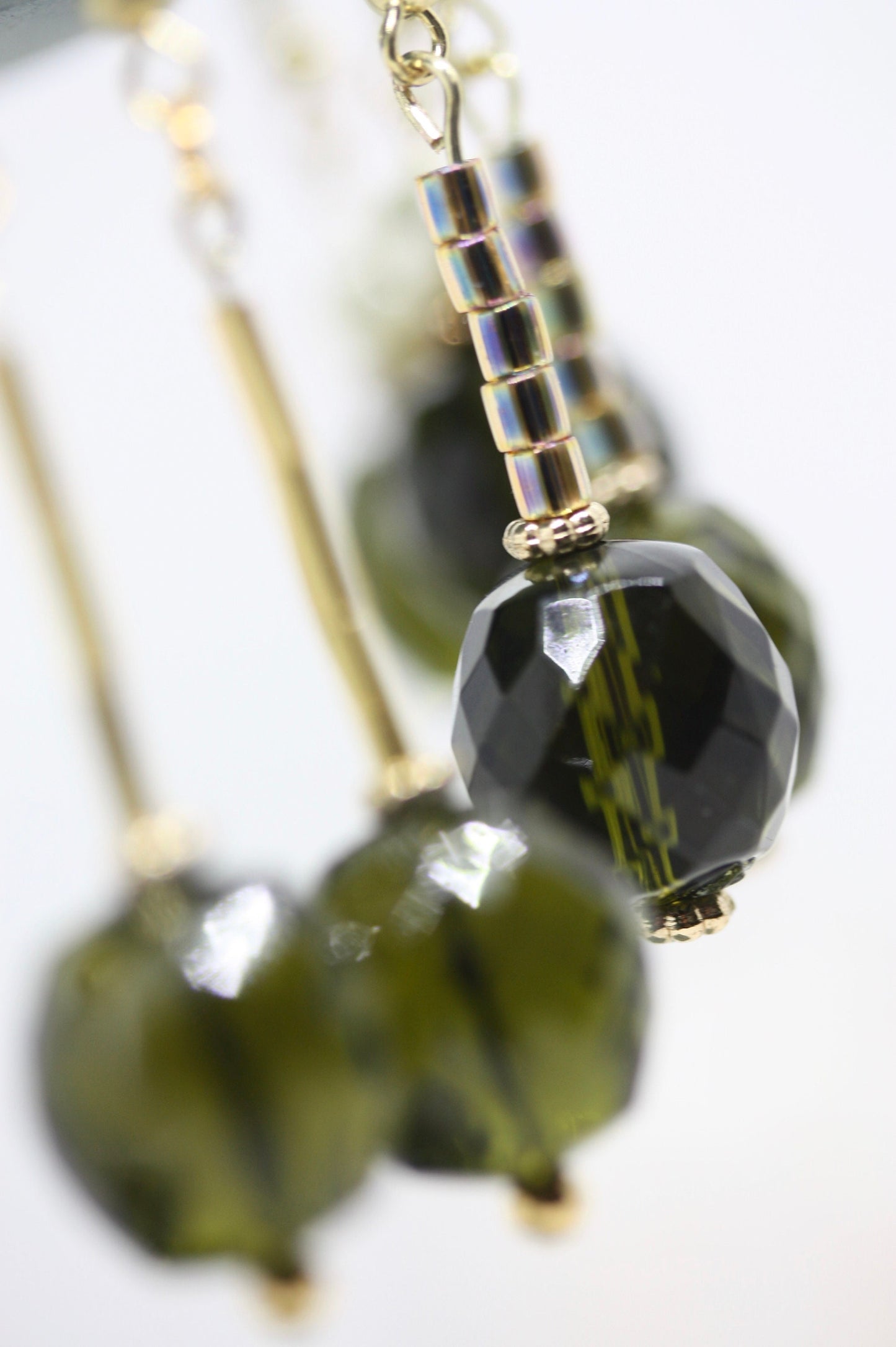 Your choice of faceted  green glass dangle earrings