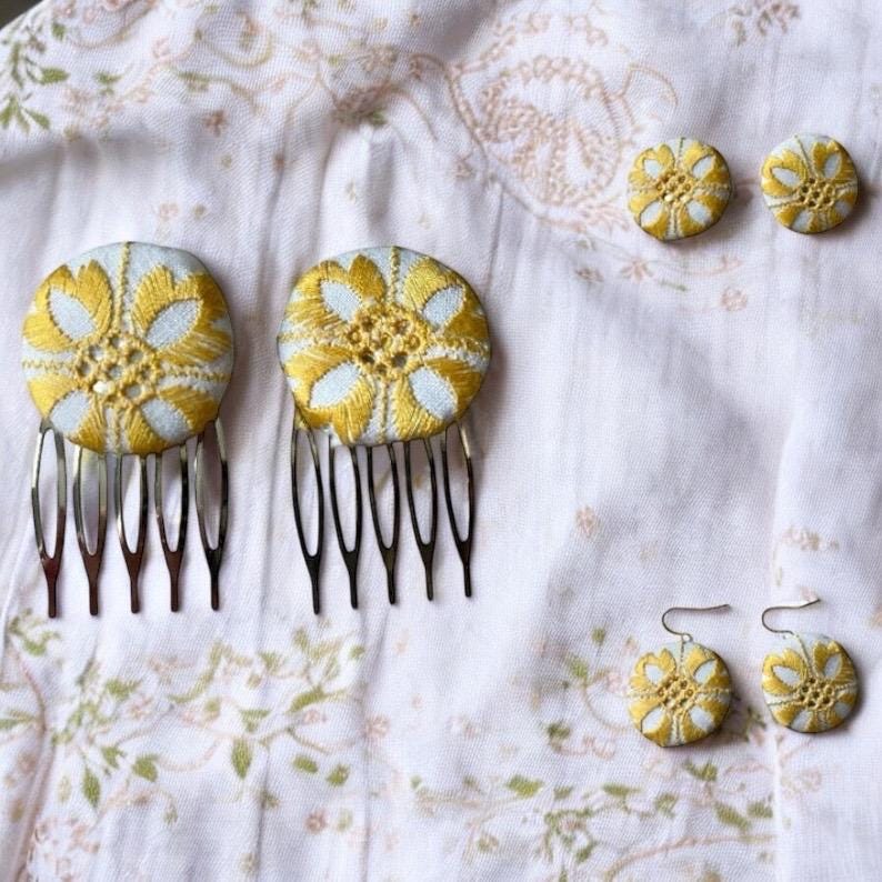 Choice of stud earrings, dangle earrings, hair combs, shanked buttons or pins all hand made from a vintage linen embroidered table runner