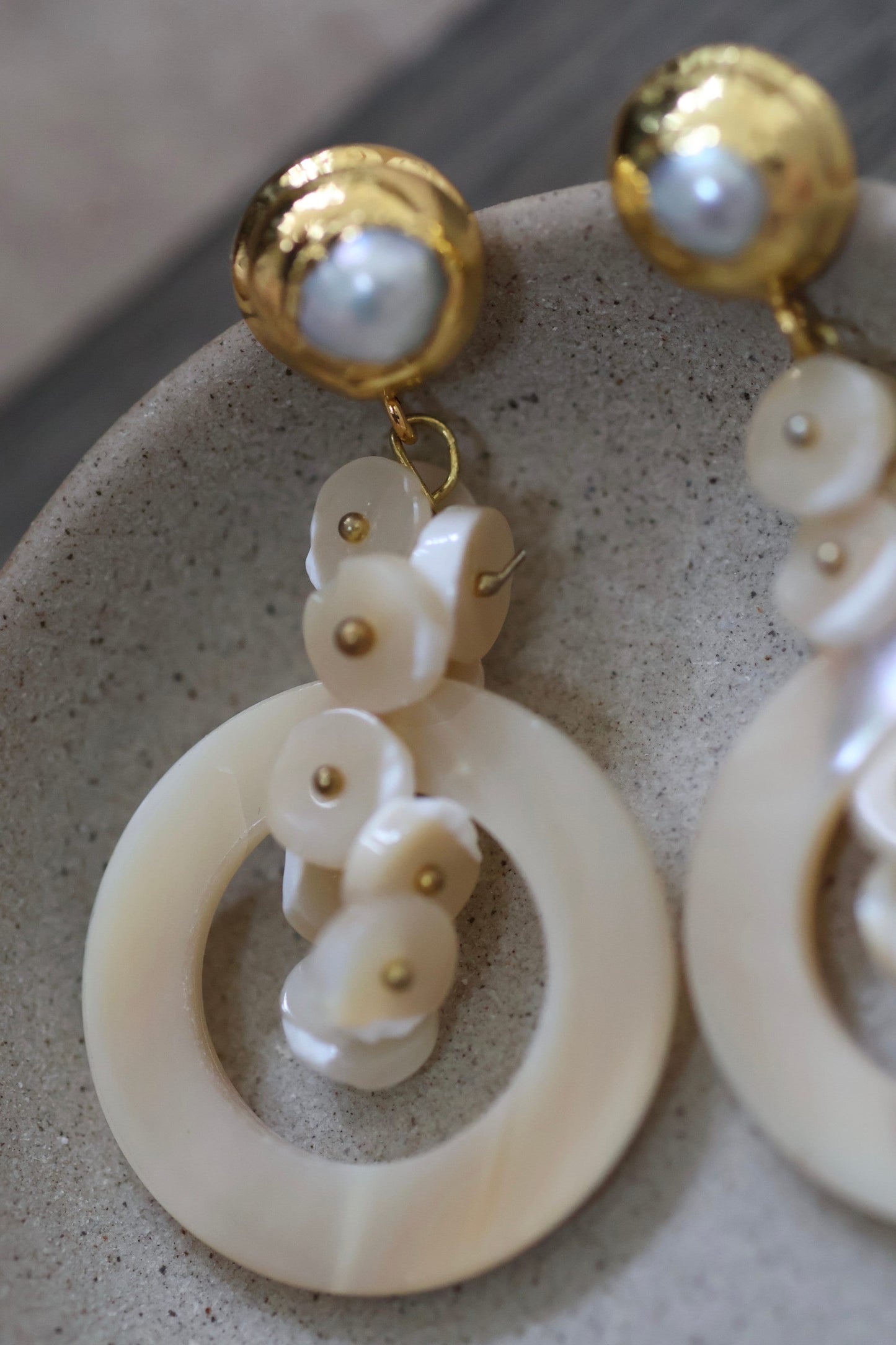 Very unique cream colored mother of pearl shell rounded hoop dangle earrings