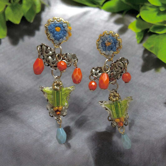 Handmade mixed media earrings made with embroidery from a vintage linen table runner, combined with glass, plastic, metal & fabric elements
