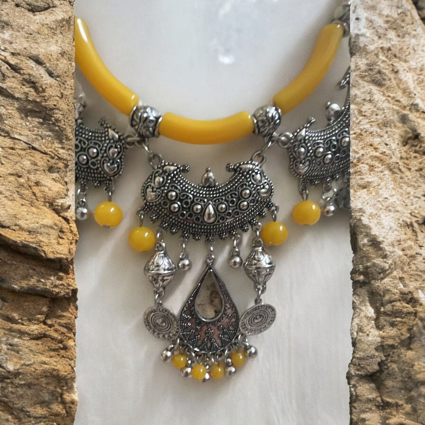 Exotic Indian style necklace with yellow beaded balls/tubes and ornate silver trim