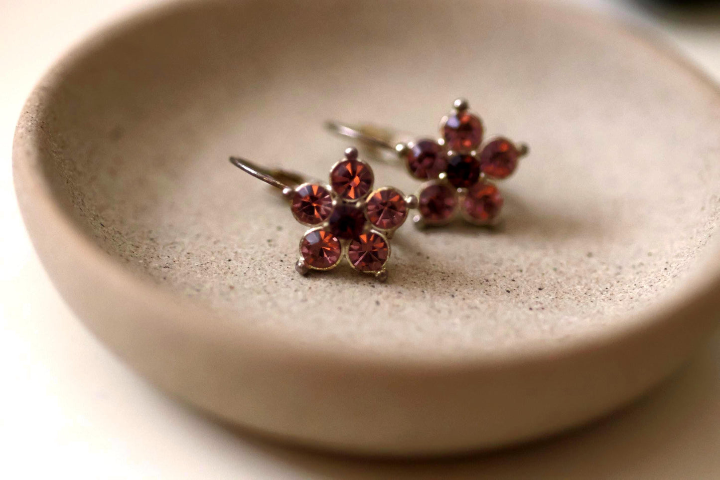 Shades of purple rhinestone flower stunning little vintage dangle earrings - 3/4"