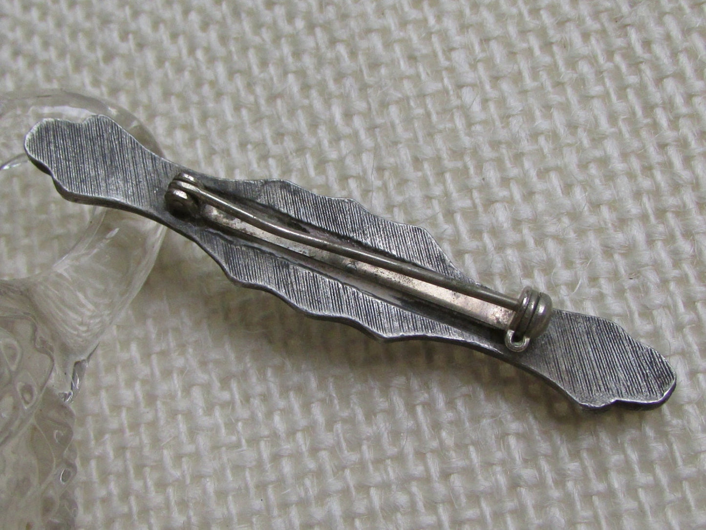 Intricately carved floral vintage bar pin