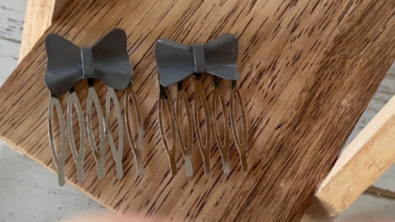 Pair of gray bows mini metal hair combs - 1" each