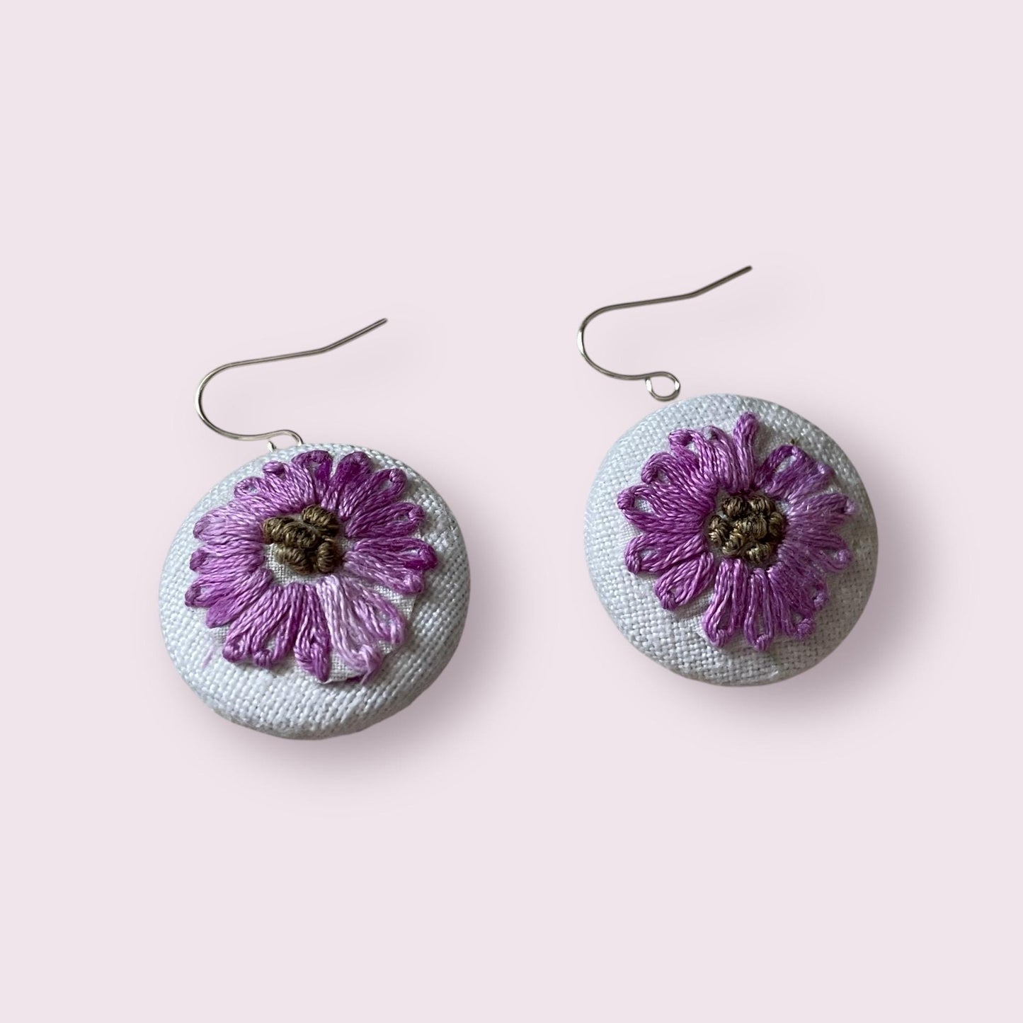 Choice of stud earrings, dangle earrings, hair combs, shanked buttons or pins all handmade from a vintage linen embroidered table runner: