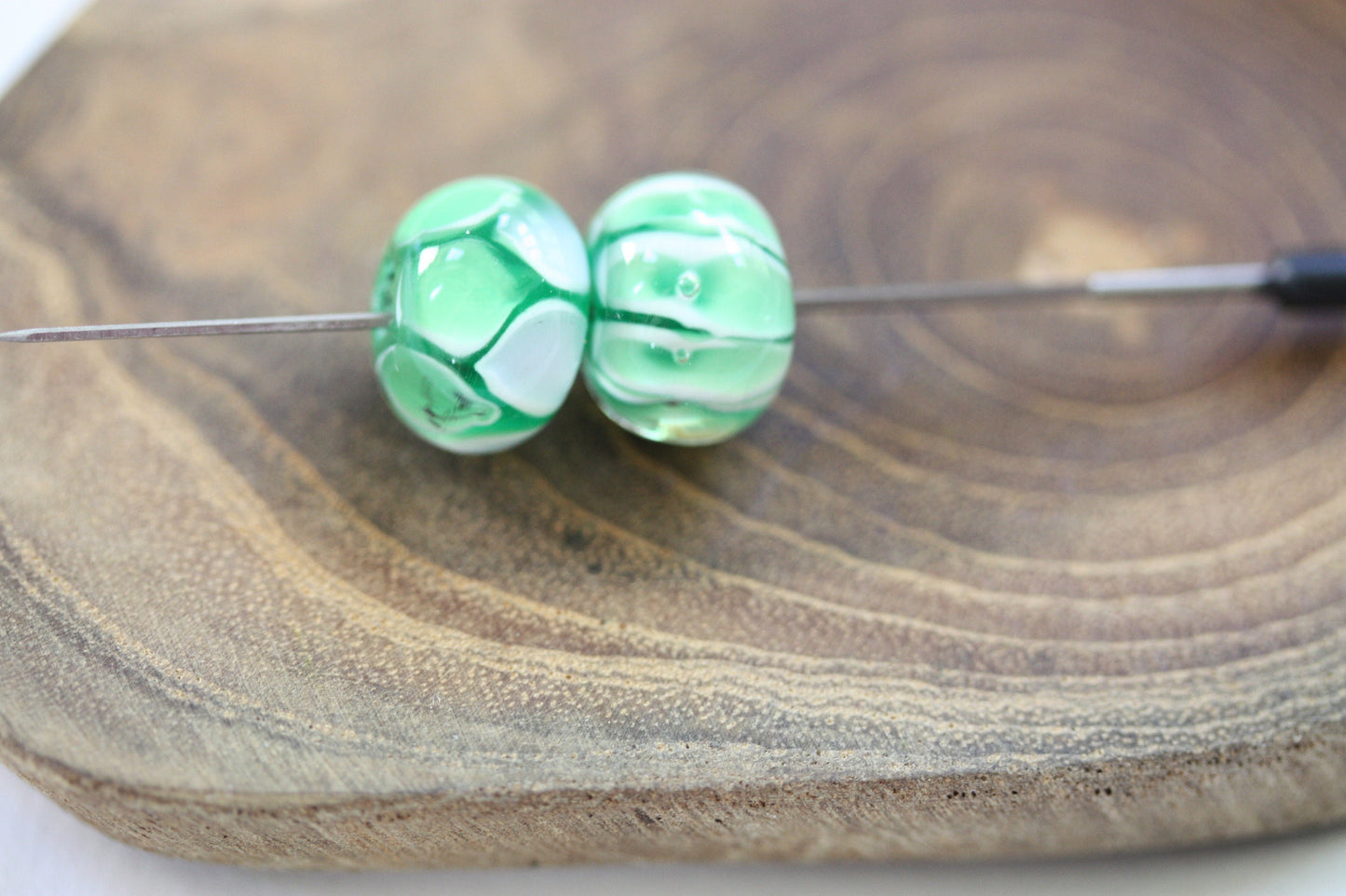 Two stunning vintage glass beads - shades of green and white