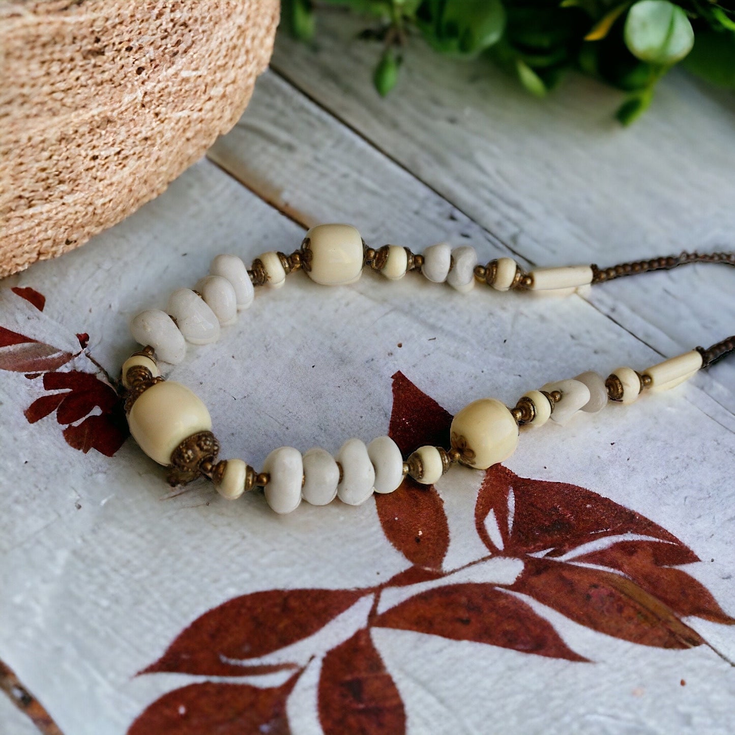 Unique vintage necklace - drilled stones, metal spacers and horn style varied shaped beads