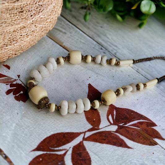 Unique vintage necklace - drilled stones, metal spacers and horn style varied shaped beads
