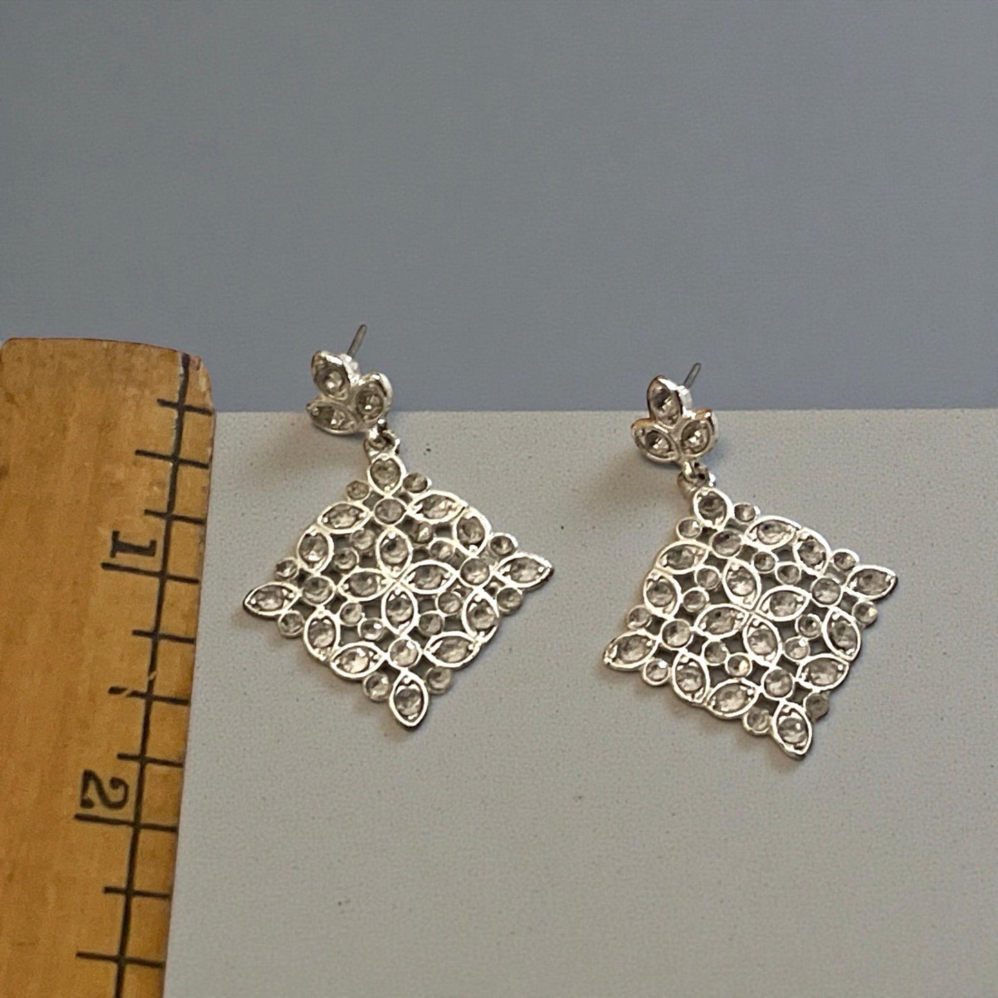 Elegant Silver-Tone Floral Design Statement Earrings with Sparkling Rhinestones