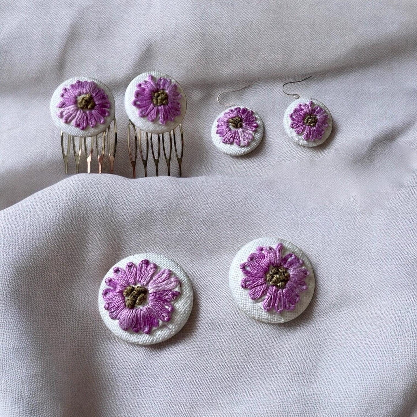 Choice of stud earrings, dangle earrings, hair combs, shanked buttons or pins all handmade from a vintage linen embroidered table runner: