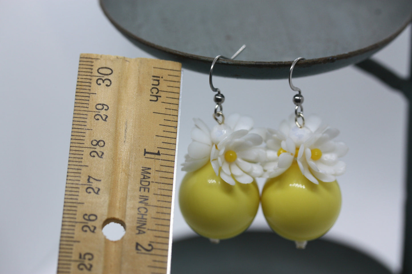 Bring the happy into your day with these flowery happy earrings