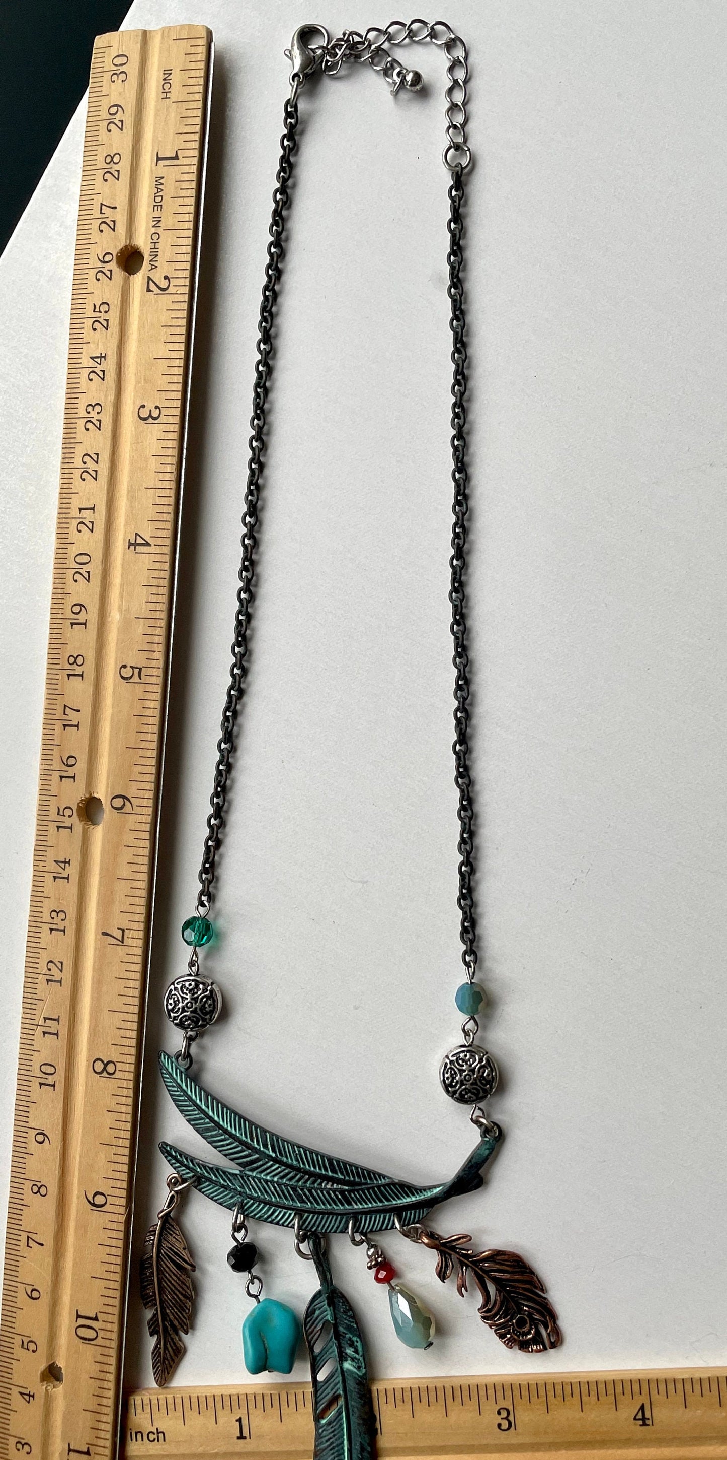 Mixed material feather and charm vintage artisan necklace