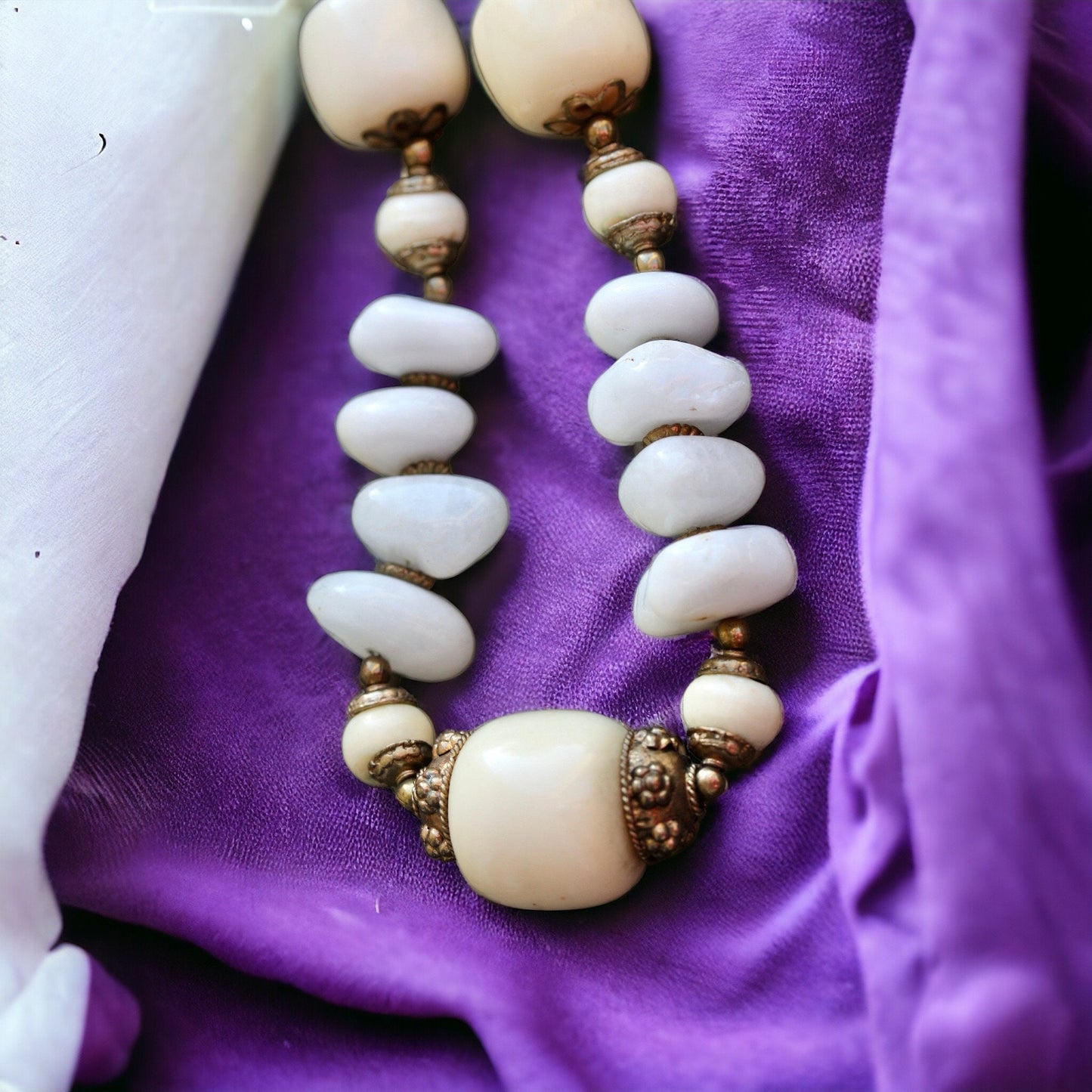 Unique vintage necklace - drilled stones, metal spacers and horn style varied shaped beads