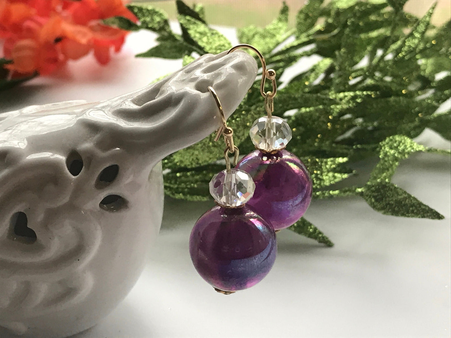 Handmade earrings with upcycled vintage purple glass ball dangles and faceted glass crystal