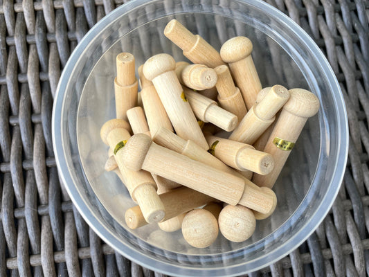 Unfinished solid wood pegs - great as craft supplies - for coat racks, doll making, wood sculptures, mixed material projects, etc.