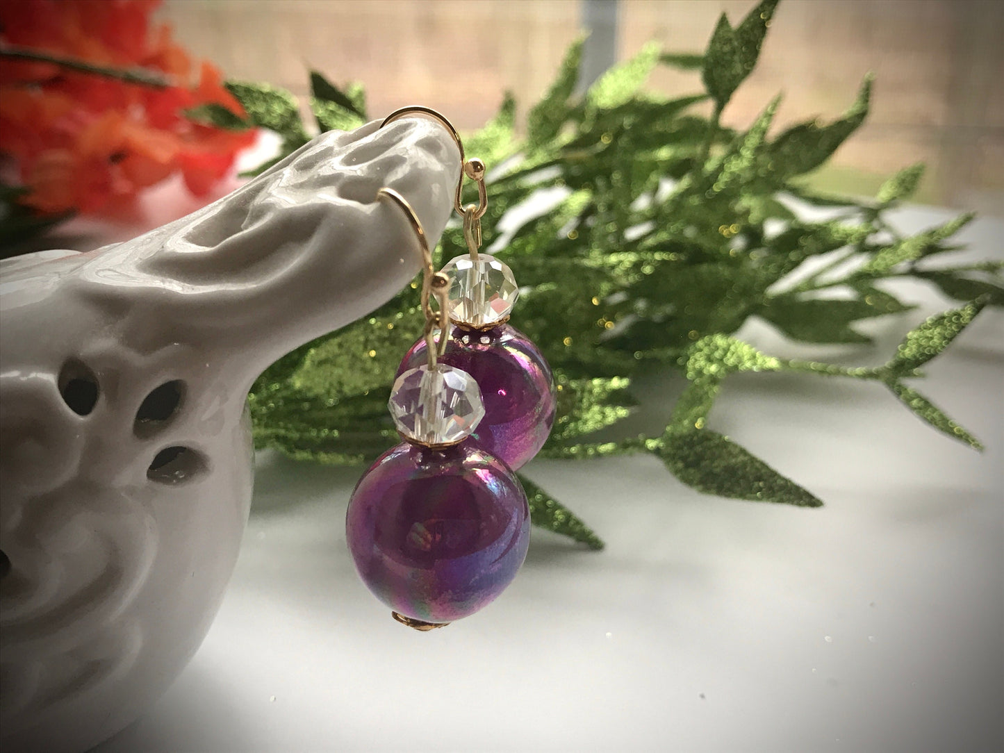 Handmade earrings with upcycled vintage purple glass ball dangles and faceted glass crystal