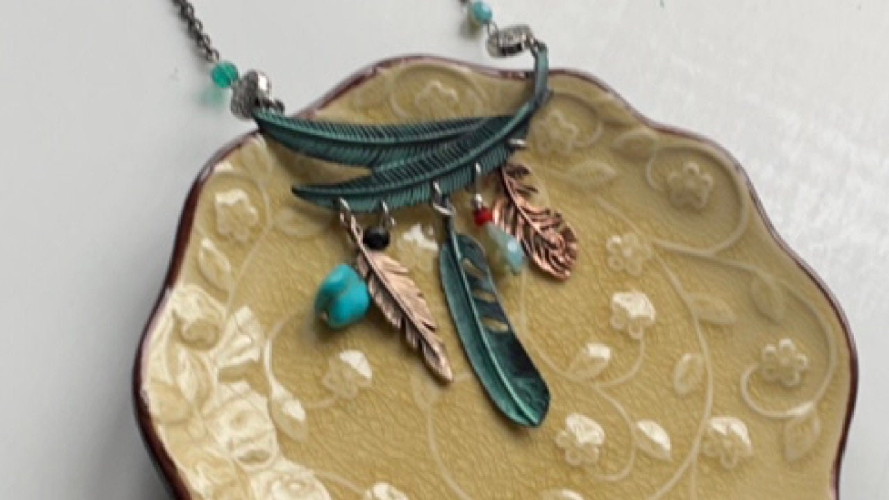Mixed material feather and charm vintage artisan necklace