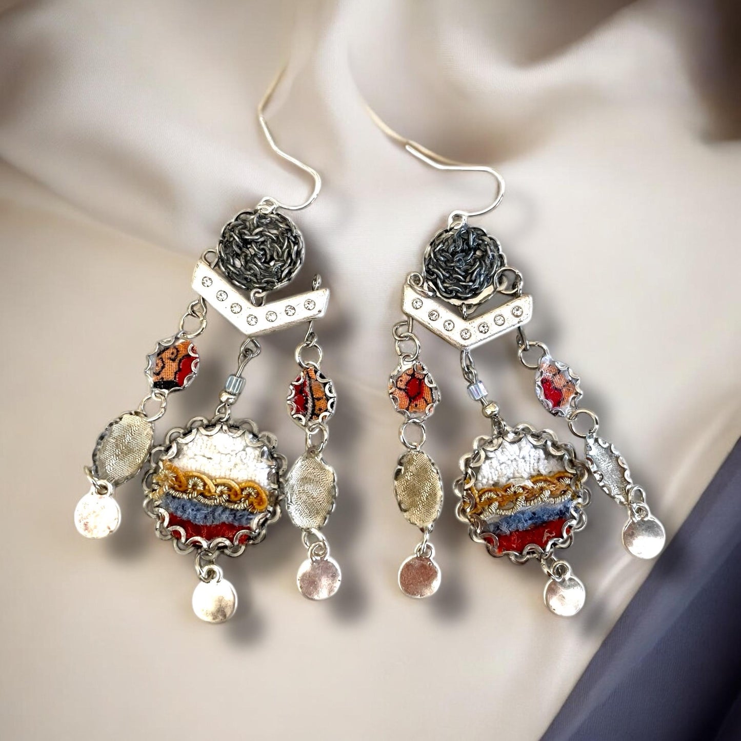 One-of-a-kind earrings made with fabric, velvet, lace, mixed metals, chain and rhinestone studded spacers. Sterling ear wires.