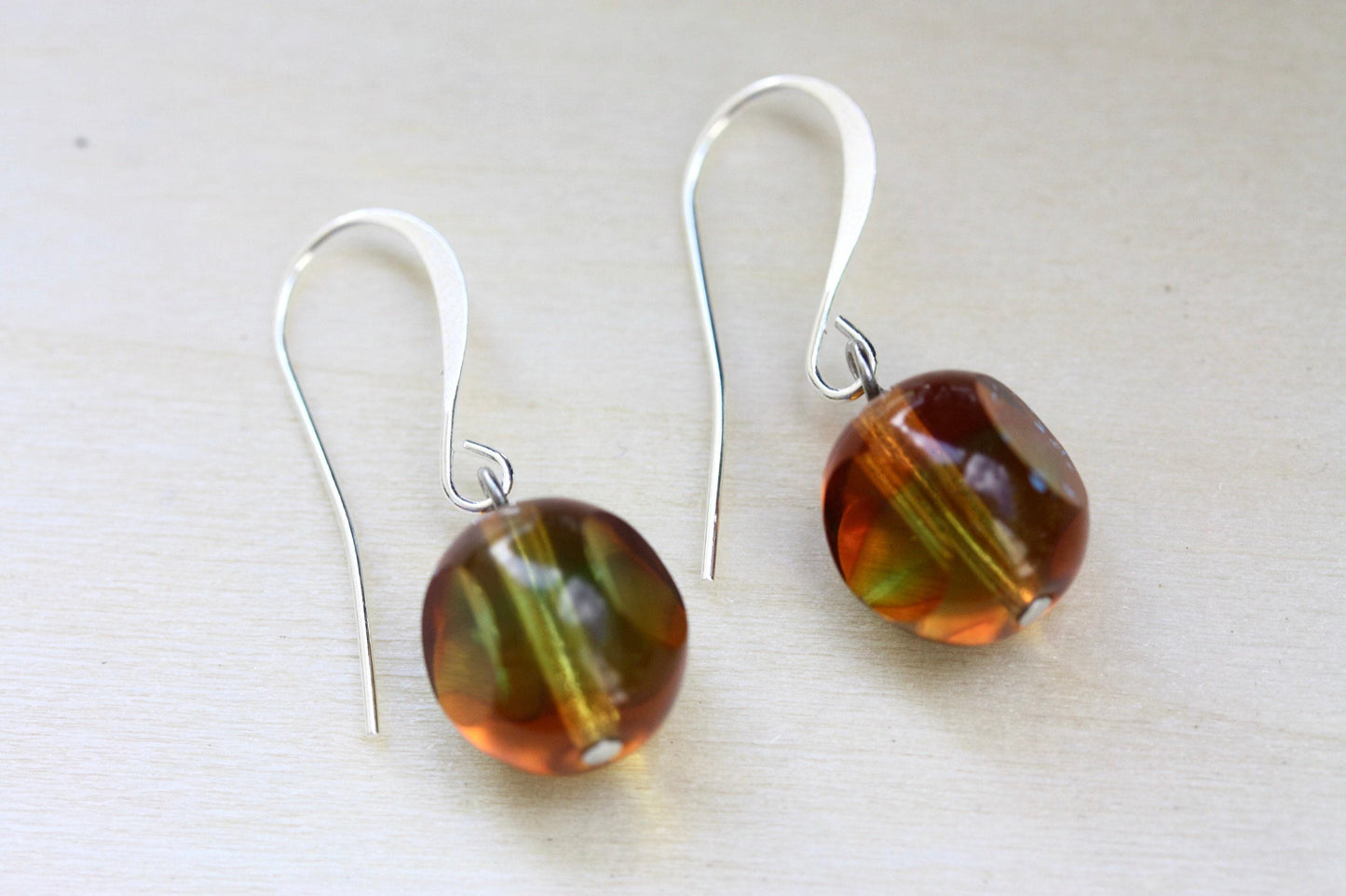 Handmade earrings with upcycled vintage multi-shaped (round with flat sides) unique glass beads - shades of orange, gold and green