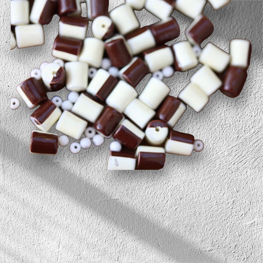 One dozen unique half brown, half creamy white vintage beads