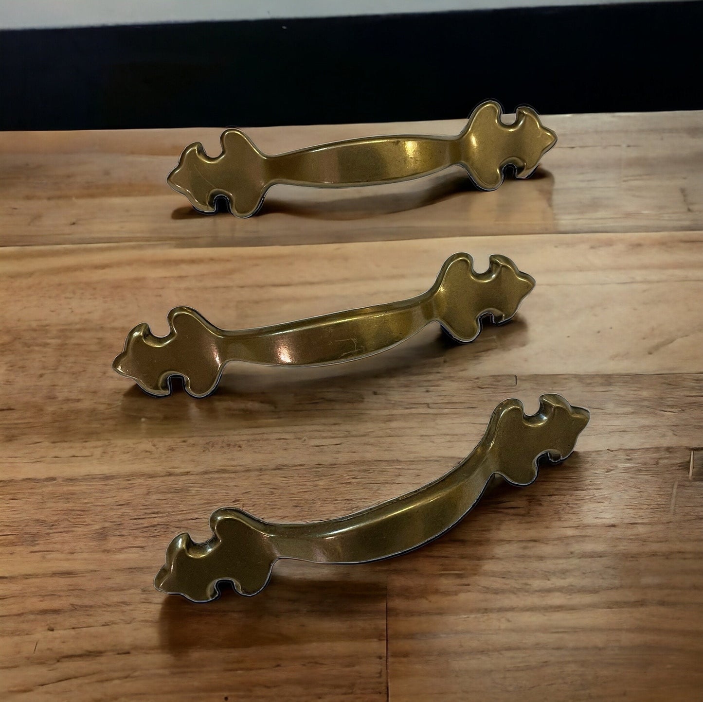 Set of three vintage brass? drawer pulls