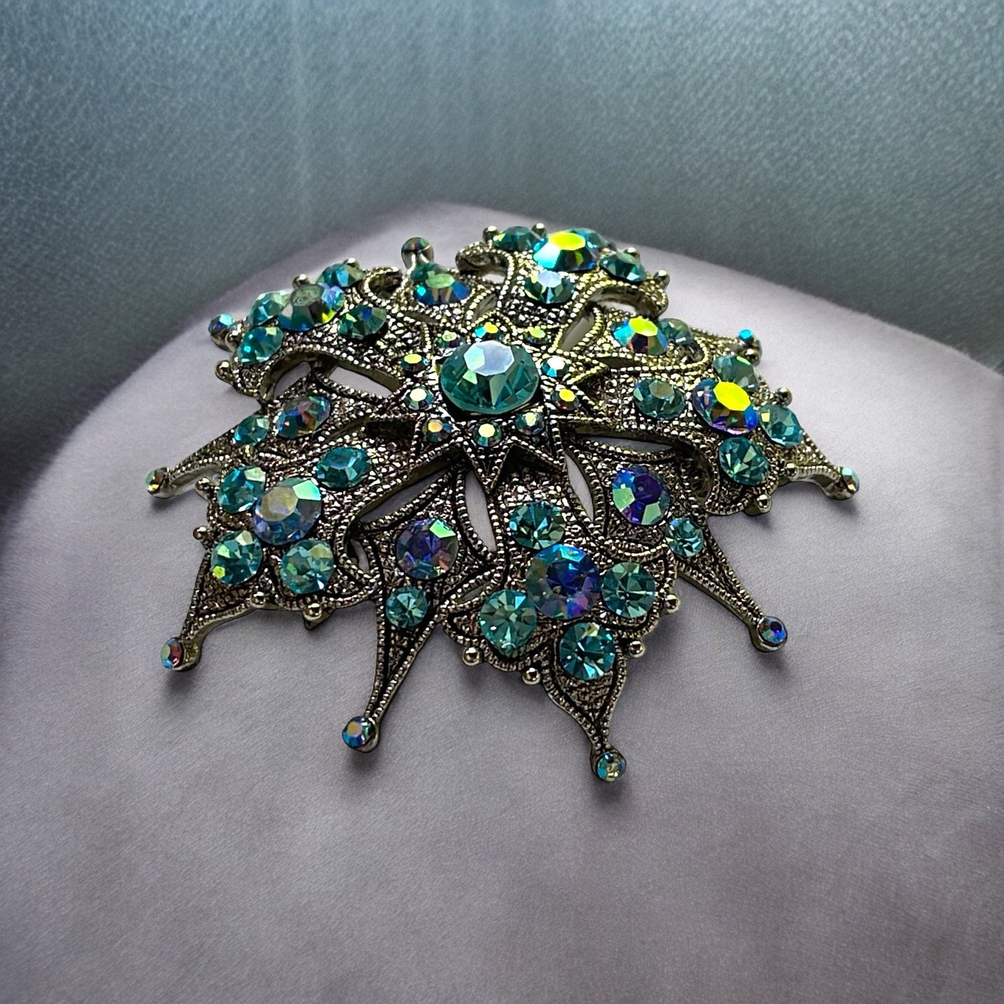Magnificent vintage pin loaded with blue AB rhinestones