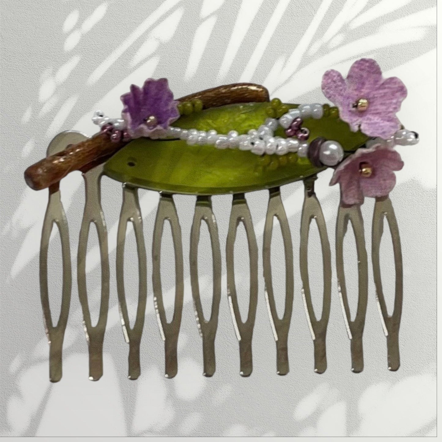 Mixed material hair comb - one-of-a-kind handmade beadwork with upcycled vintage fabric flowers, green "leaf" and branch