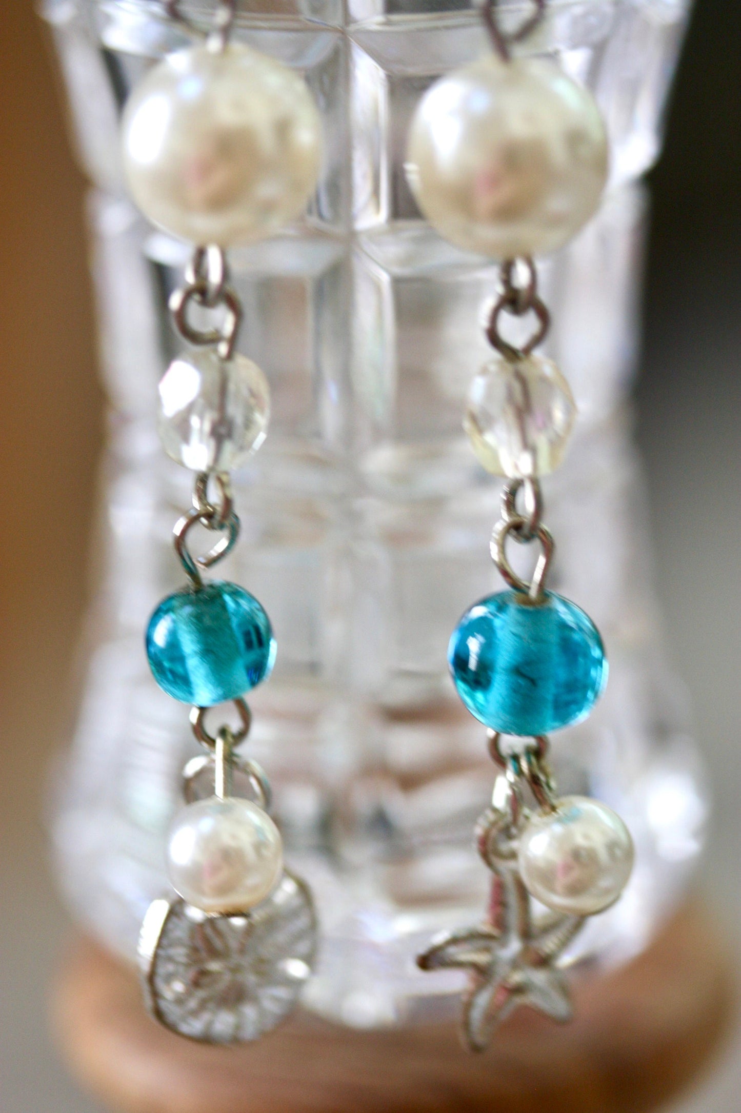 Faux pearl, clear crystal and recovered blue vintage glass dangle earrings with starfish and silver dollar metal shell