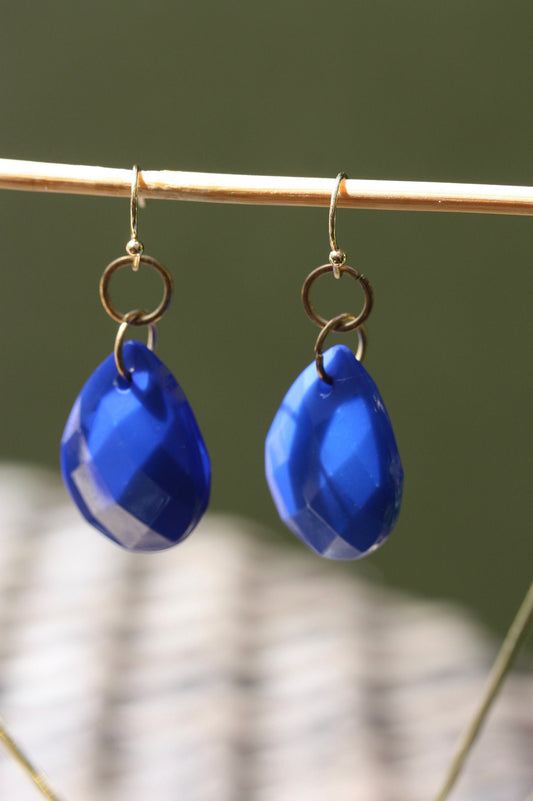 Royal blue faceted teardrop-shaped dangle earrings