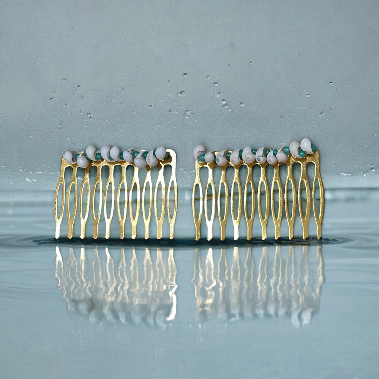 Stunning hand strung white shell hair combs with turquoise blue glass seed beads on goldtone metal hair combs