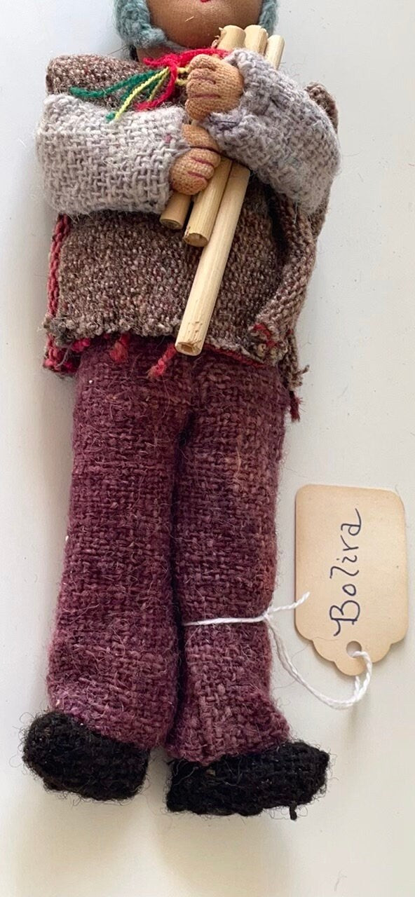 Vintage Bolivian man playing panpipes - collectible folk art doll with handmade woven wool clothing