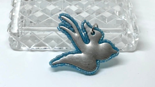 Blue beaded dove necklace pendant