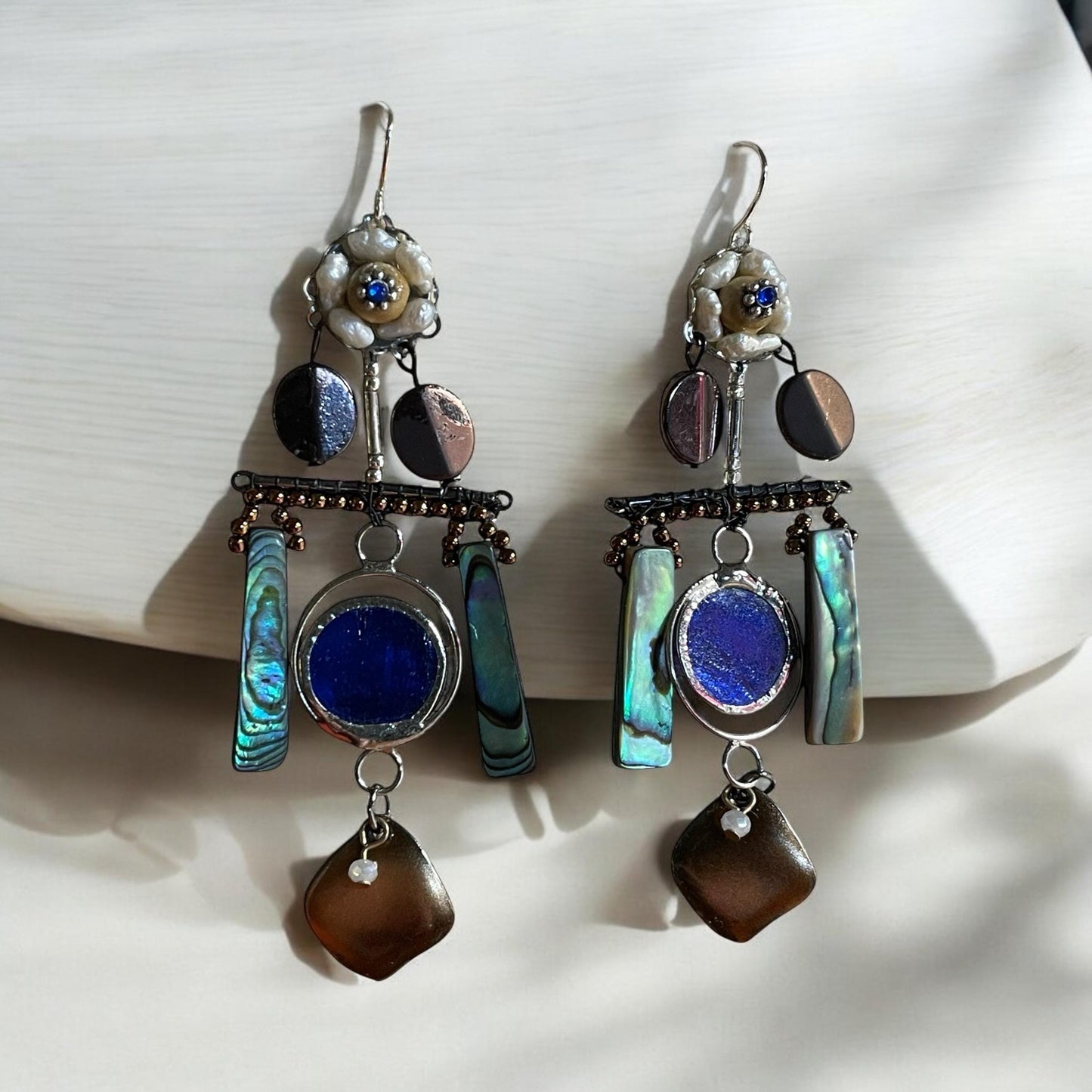 Abalone mixed media collage earrings with mixed metals and findings, pearls, wood, beadwork and abalone shells; Sterling silver ear wires