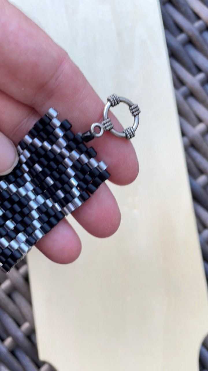 Stunning vintage silver and black hand woven vintage beadwork bracelet