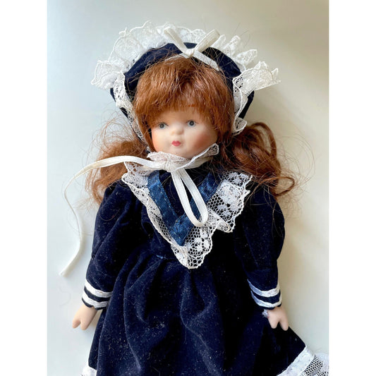 Vintage porcelain doll - red hair, royal blue velvet dress