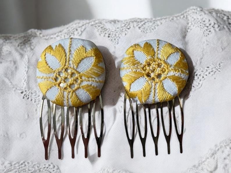 Choice of stud earrings, dangle earrings, hair combs, shanked buttons or pins all hand made from a vintage linen embroidered table runner