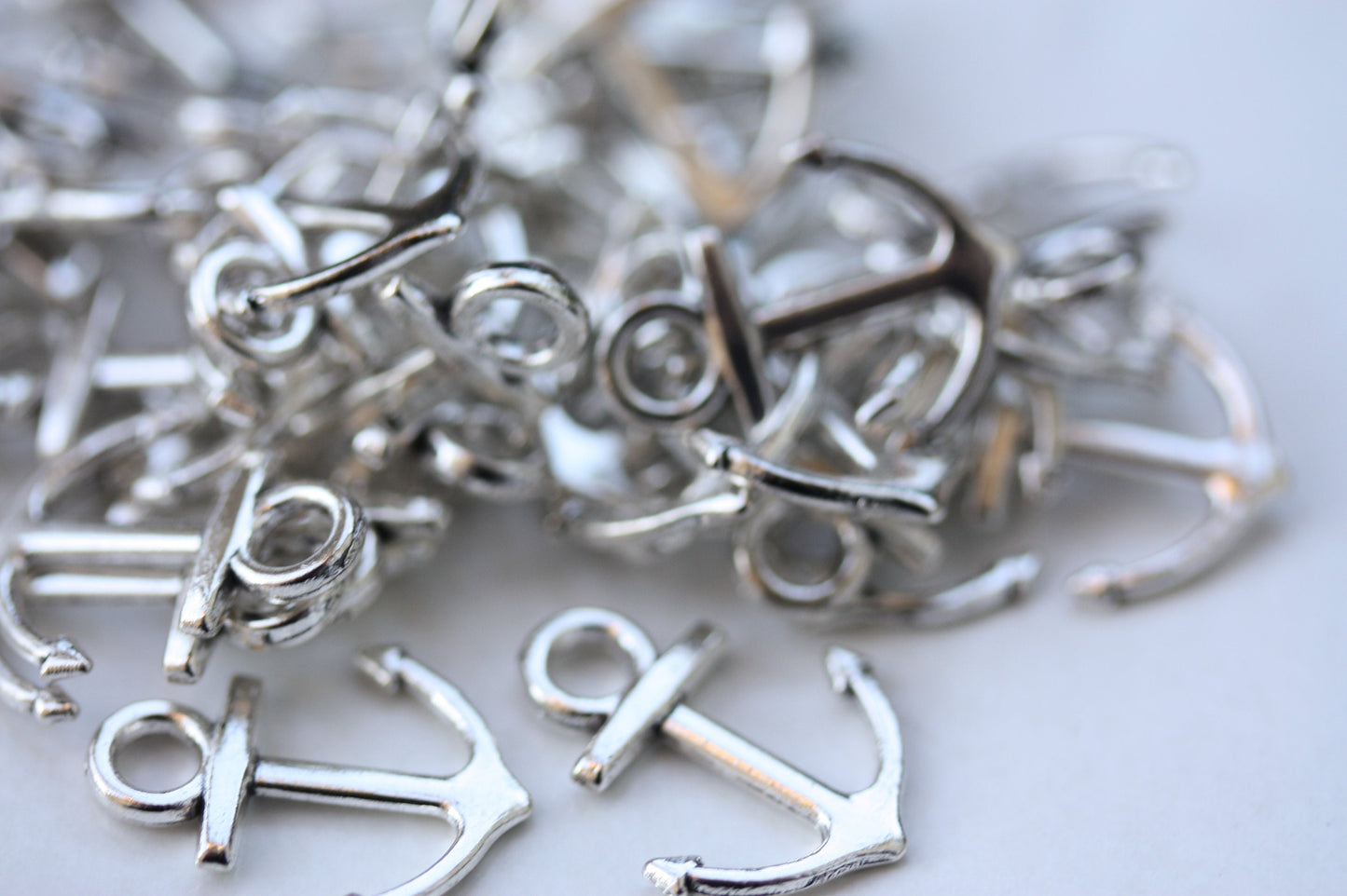 4 vintage boat anchor charms