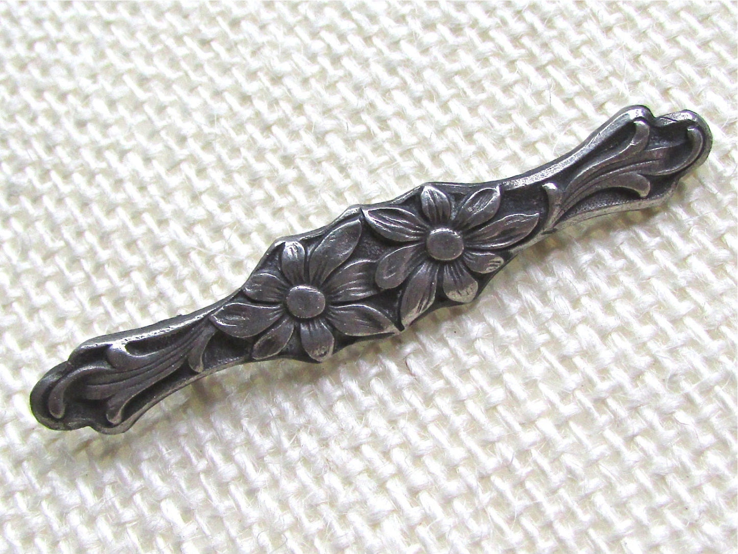 Intricately carved floral vintage bar pin