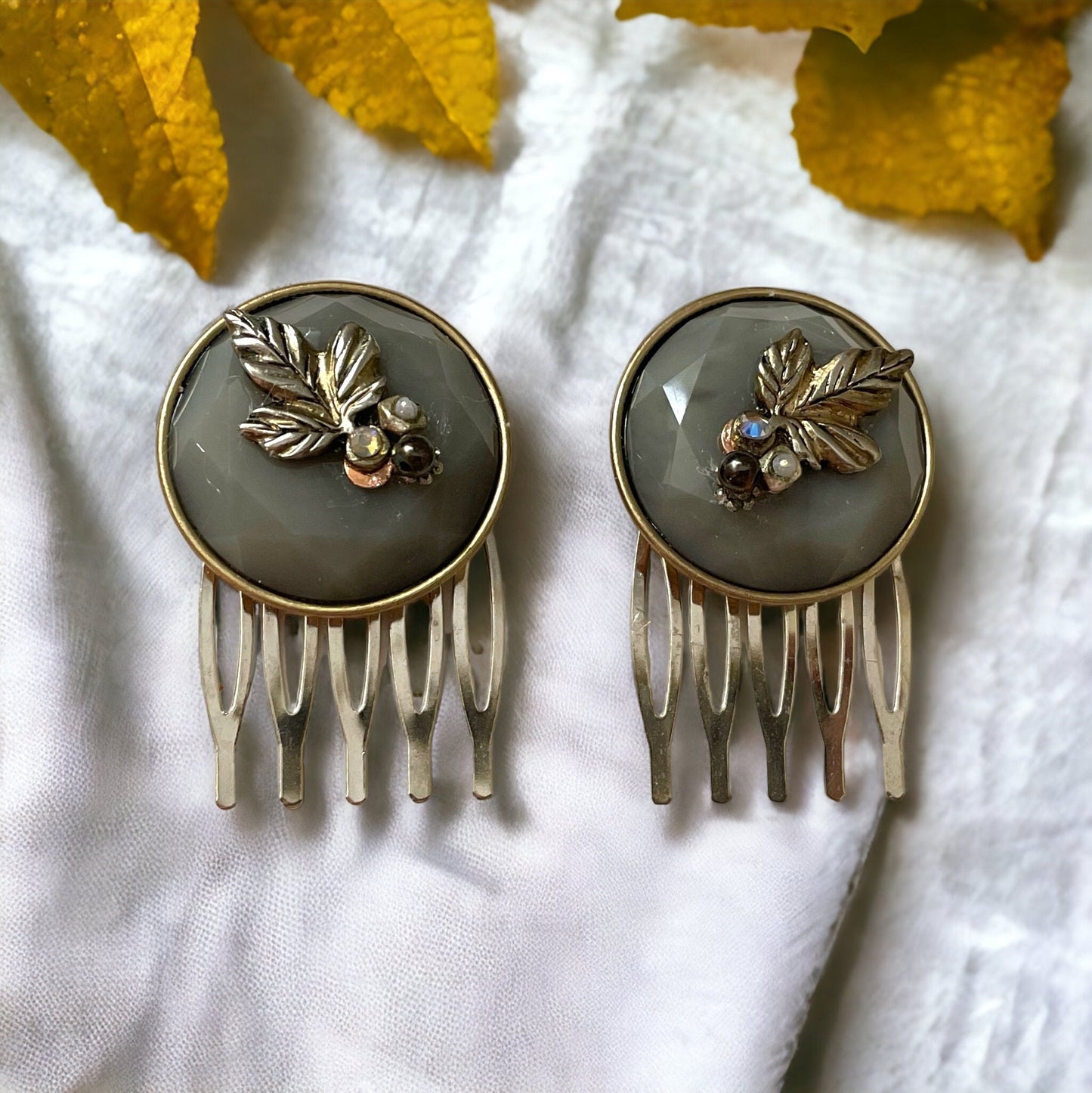 Pair of small 1" silvery gray round hair combs with silver leaves, rhinestones, faux baby pearls and upcycled metal components