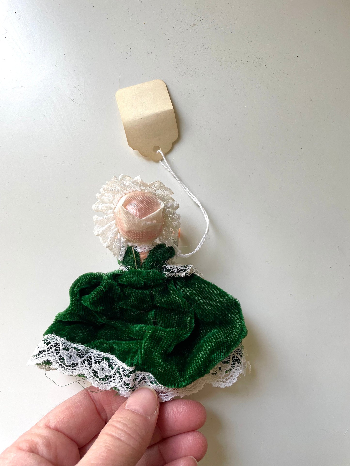 Stunning vintage collectible art baby Doll from Belgium with green velvet dress and lace overlay